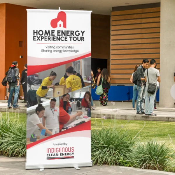 A HEET pop-up banner displayed outdoors at a community workshop stop.