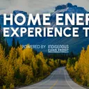 A Home Energy Experience Tour pop-up banner outdoors, powered by Indigenous Clean Energy.
